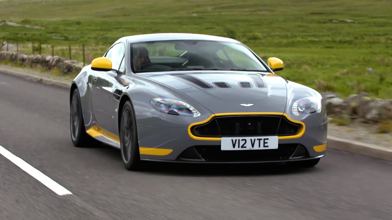 aston v12 vantage s vs porsche 9